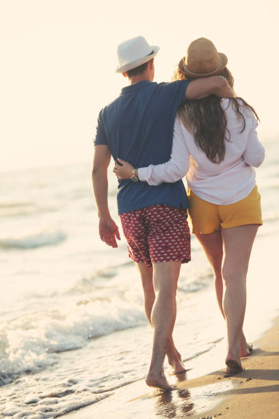 istock Beach of summer time and two lovers 1016864650
