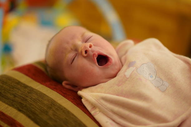 istock Tired Baby Yawning 1016872730