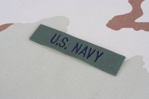 istock US NAVY branch tape on desert camouflage uniform 1016879702