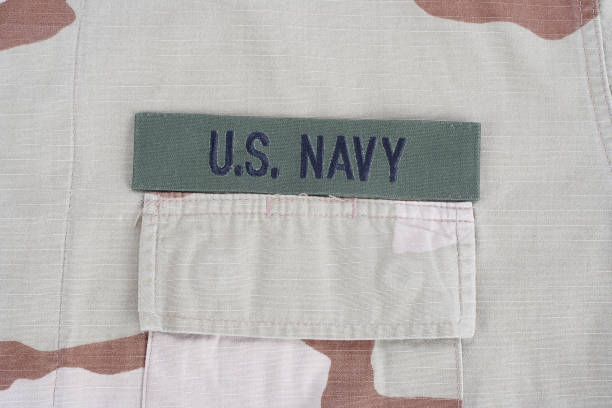 istock US NAVY branch tape on desert camouflage uniform 1016879836