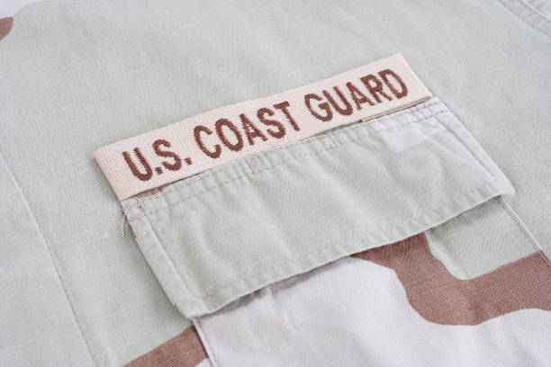 istock US COAST GUARD branch tape on desert camouflage uniform 1016882080