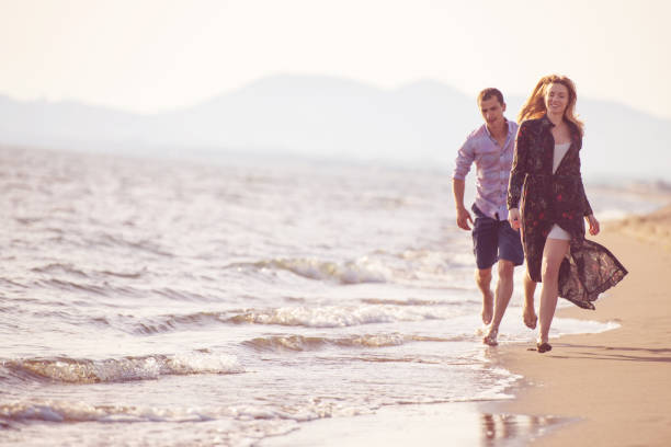 istock Beach of summer time and two lovers 1016882608
