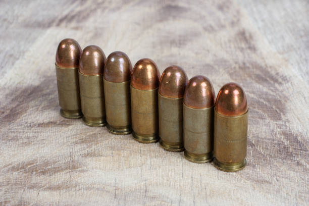 istock cartridges on wooden background 1016884840