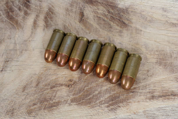 istock cartridges on wooden background 1016884882