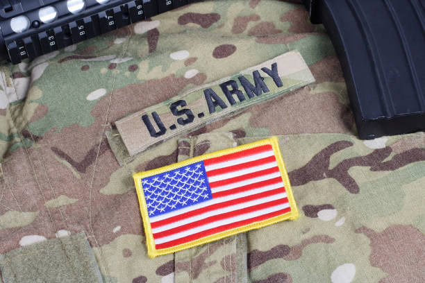 istock M4 carbine with ammunition on US Army uniform 1016895166