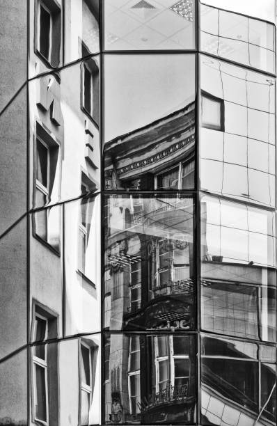 istock Reflections Of Buildings In Windows 1016902606