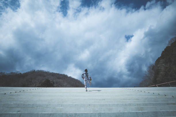 istock fitness woman and sky 1016909454