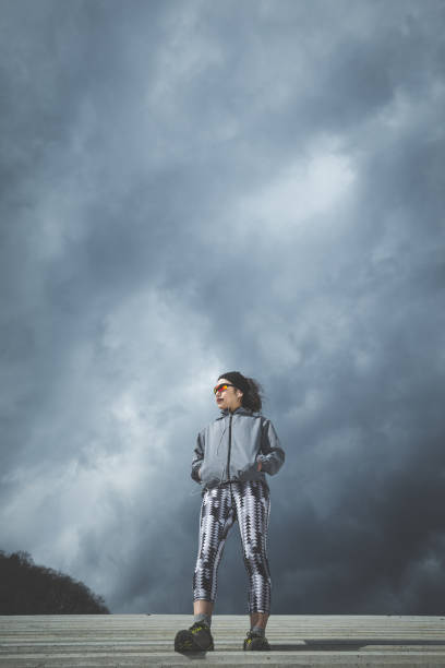 istock fitness woman and sky 1016909468