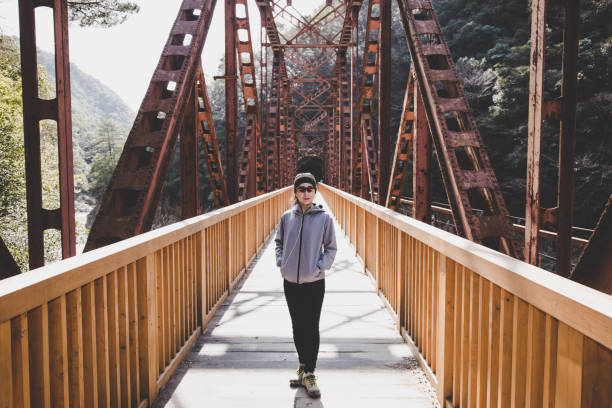 istock Fitness woman on bridge 1016909658