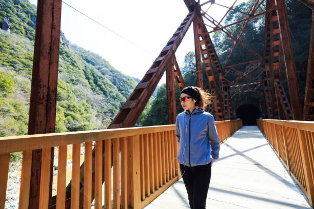 istock Fitness woman on bridge 1016909768