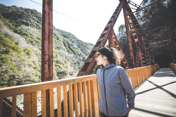 istock Fitness woman on bridge 1016909776