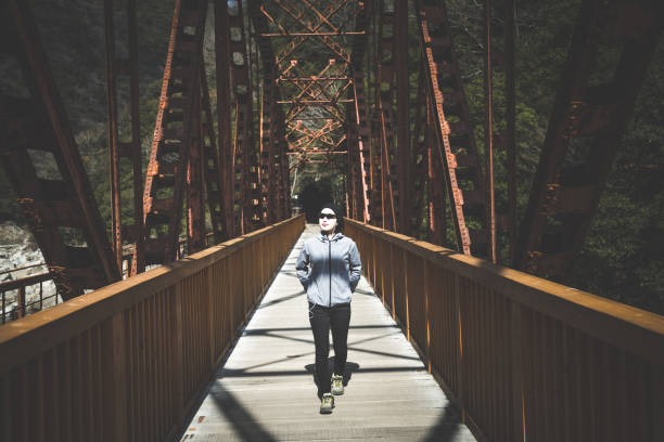 istock Fitness woman on bridge 1016909778