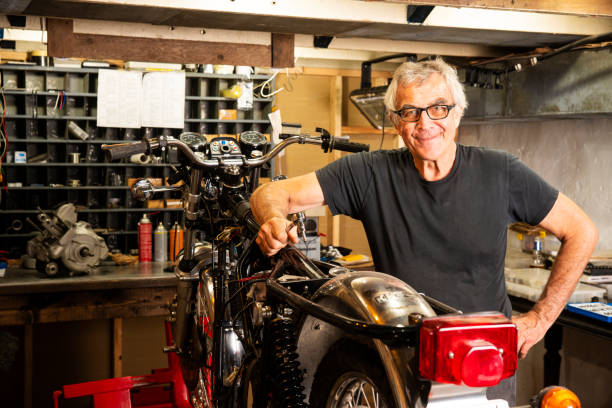 istock A specialist classic motorcycle restorer in his workshop 1016915056