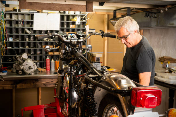 istock A specialist classic motorcycle restorer in his workshop 1016915058