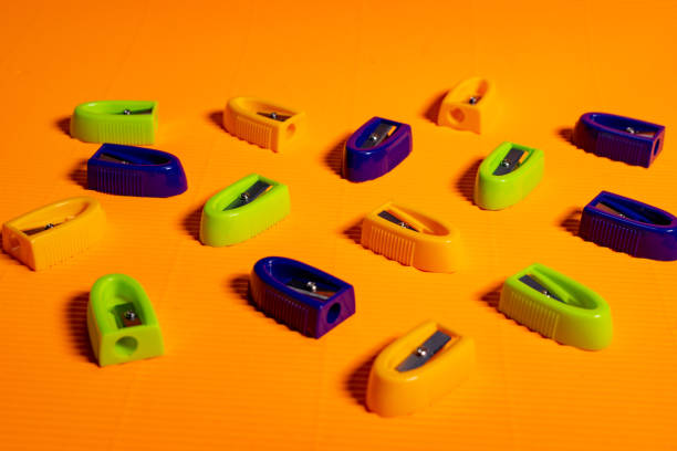 istock education equipment on orange background. 1016942998