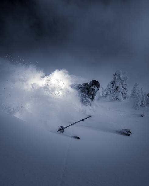 powder skiing Powder skiing lit with flash. ski resort flash stock pictures, royalty-free photos & images