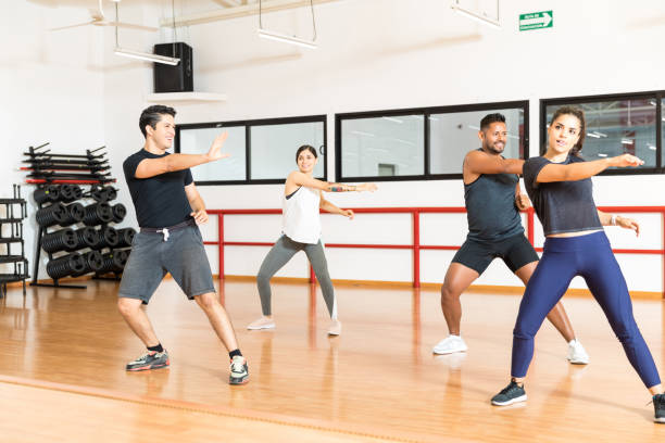 istock Multiethnic Friends Dancing Together In Gym 1016950778