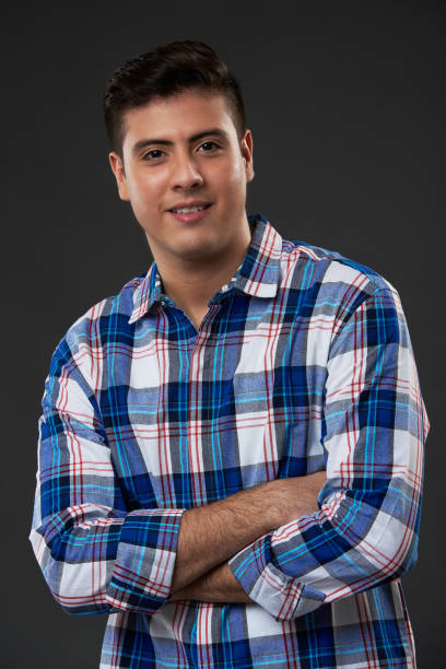 istock Young man with crossed arms 1016952978