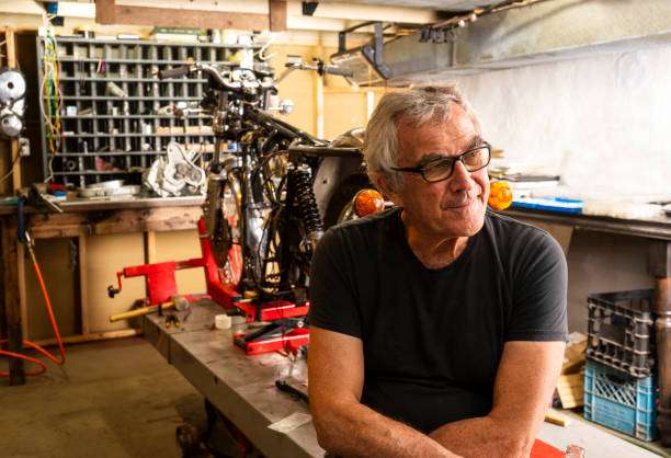istock A specialist classic motorcycle restorer in his workshop 1016960912
