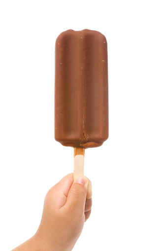 child hand holding an ice Chocolate bar