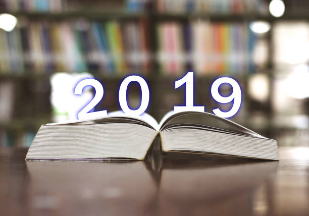 istock Happy New Year 2019 on books in the library. 1017011268