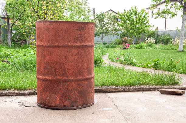 istock Rusty barrel in the green garden 1017027884