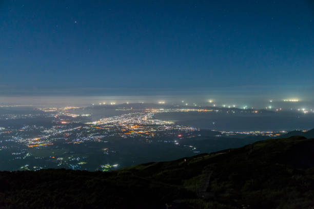 istock Night view of Yonago city from Mount Daisen. (Tottori, Japan) 1017031014