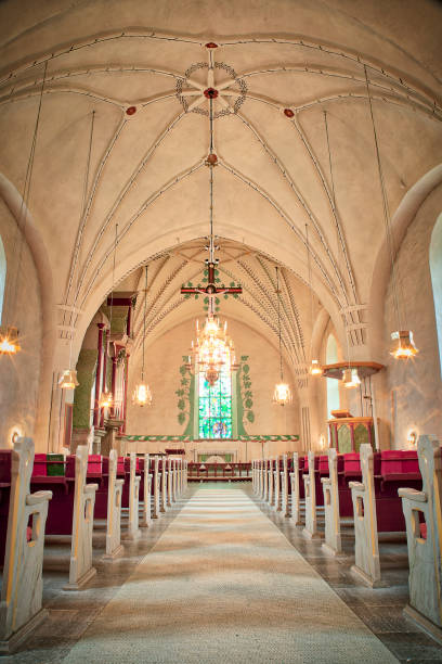 istock Inside Church with Rows of Benches 1017035580