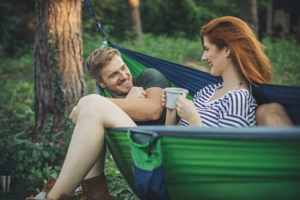 istock Young couple enjoy in hammock 1017054778