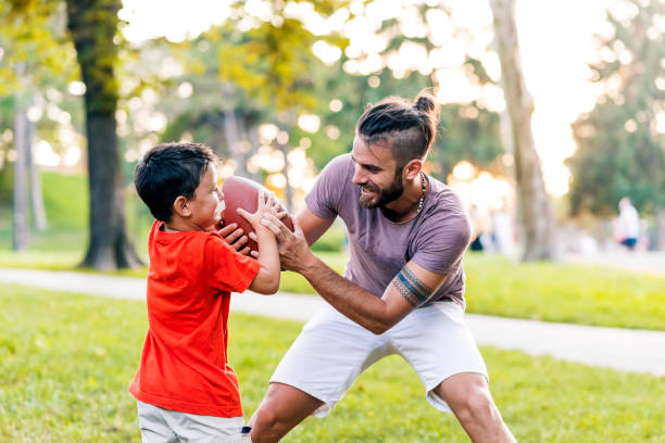 istock American football with my dad 1017065188