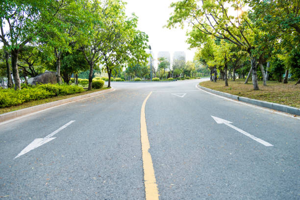 istock Asphalt highway with arrow sign 1017068438