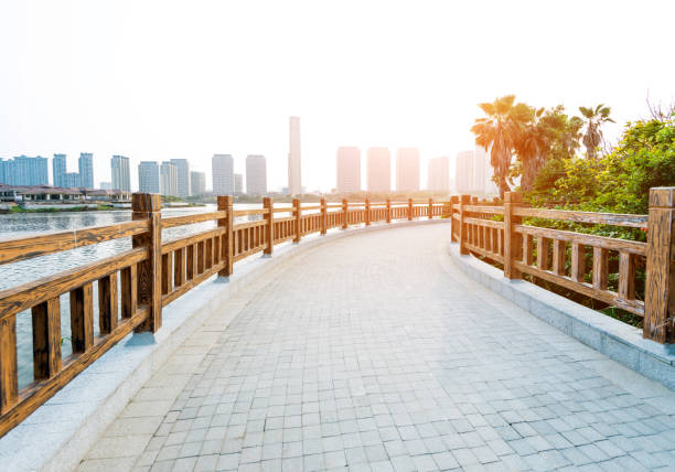 istock Bridge and skyscraper by the sea 1017071144