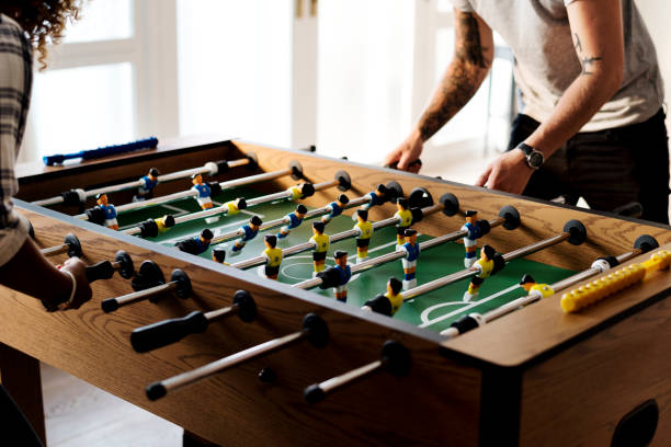 people playing table football - time duration imagens e fotografias de stock