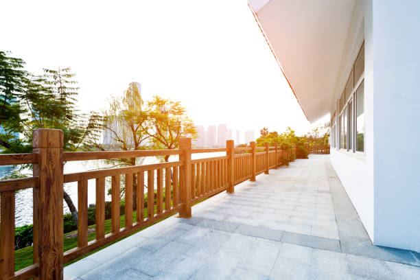 istock Backyard patio with trees in city 1017079890