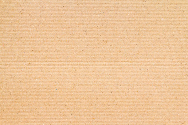 istock Brown paper box or Corrugated cardboard sheet texture 1017079956