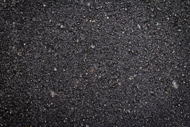 istock close up of new asphalt road texture 1017083852