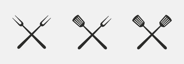 Barbecue tools icons. Grill fork and Spatula isolated on white background. Vector illustration. Vector illustration Spatula stock illustrations