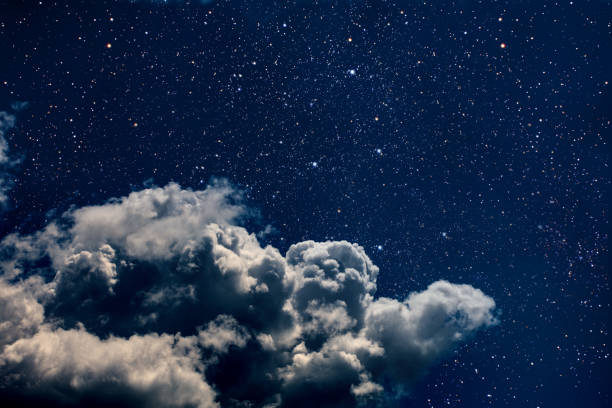 istock backgrounds night sky with stars and moon and clouds 1017102934