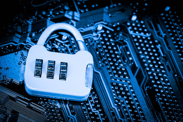 istock Abstract,close up of Lock on Mainboard Electronic computer background. (best internet top security) 1017103602