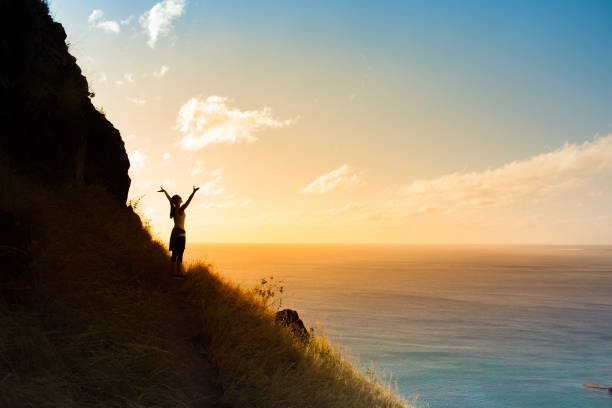 istock Women hiker enjoying the view from the mountain cliff 1017117368