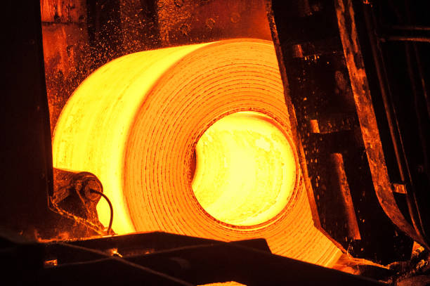 istock Roll of hot metal on the conveyor belt 1017119980