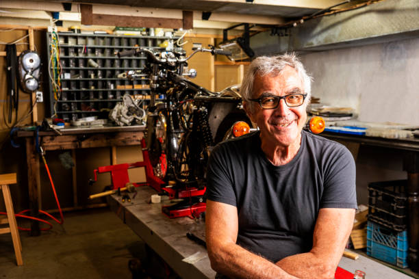 istock A specialist classic motorcycle restorer in his workshop 1017133422