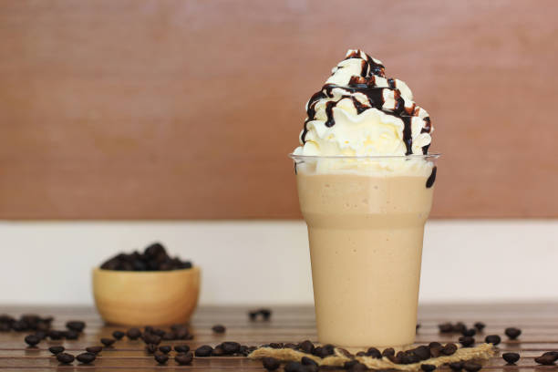 istock ice coffee and caramel smoothie on table in coffee shop. 1017146790