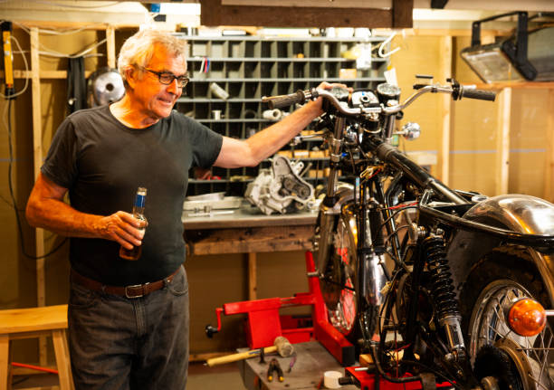 istock A specialist classic motorcycle restorer in his workshop 1017147536