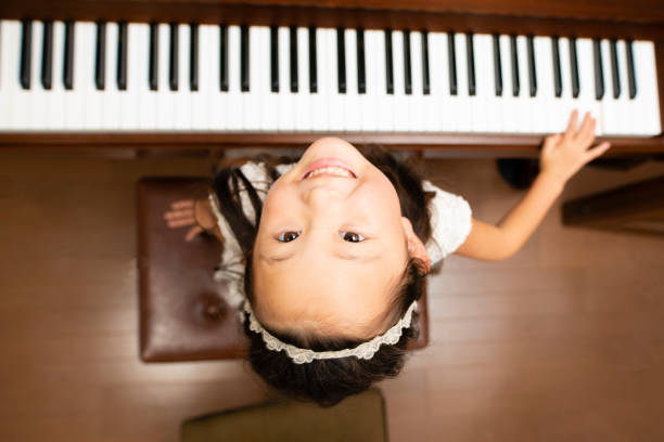 istock Girl play the piano 1017150020