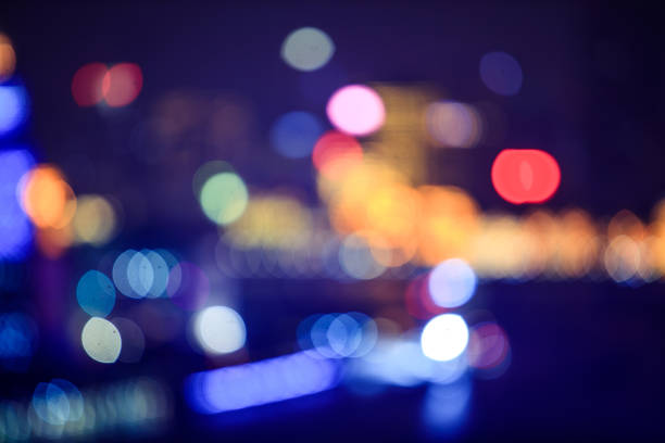 istock Blurred nighttime scene of a city  bokeh， 1017174562