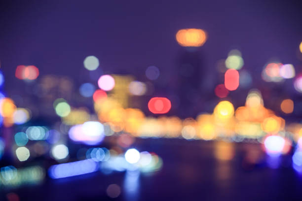istock Blurred nighttime scene of a city  bokeh， 1017174654