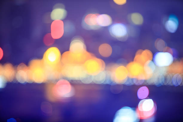 istock Blurred nighttime scene of a city  bokeh， 1017174798