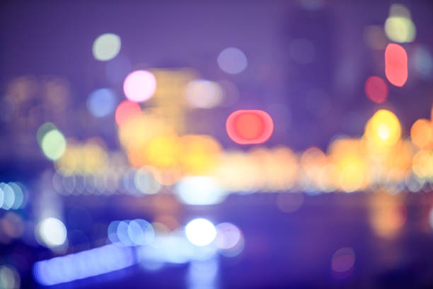 istock Blurred nighttime scene of a city  bokeh， 1017174822
