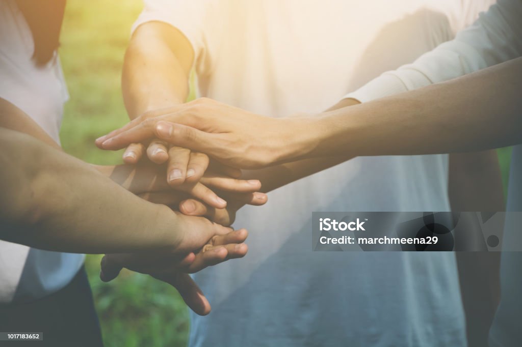 Team teamwork business join hand together concept, Power of volunteer charity work, Stack of people hand Charity and Relief Work Stock Photo